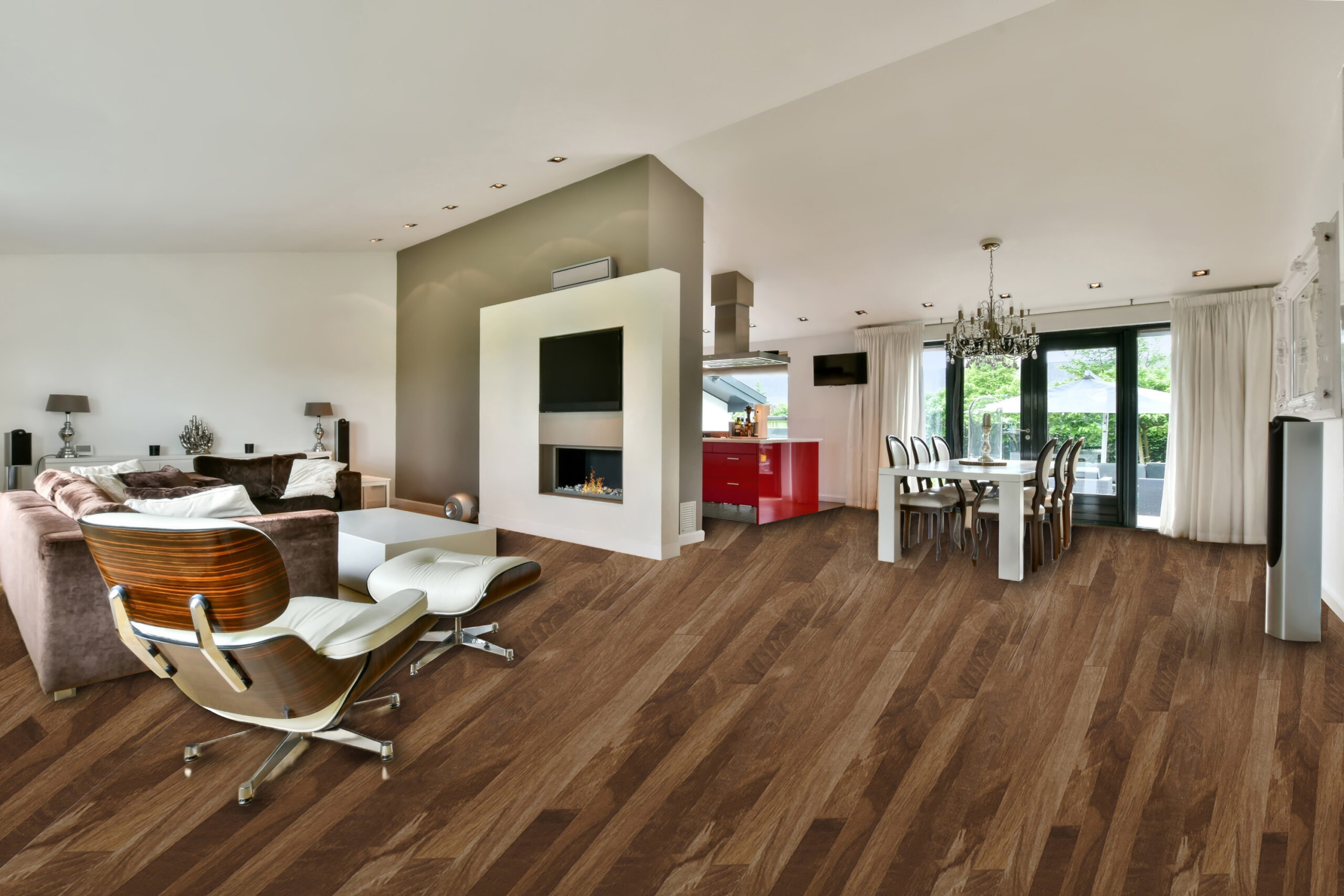 Cozy expensive interior of a studio apartment with a large sofa, fireplace, dining area and open kitchen